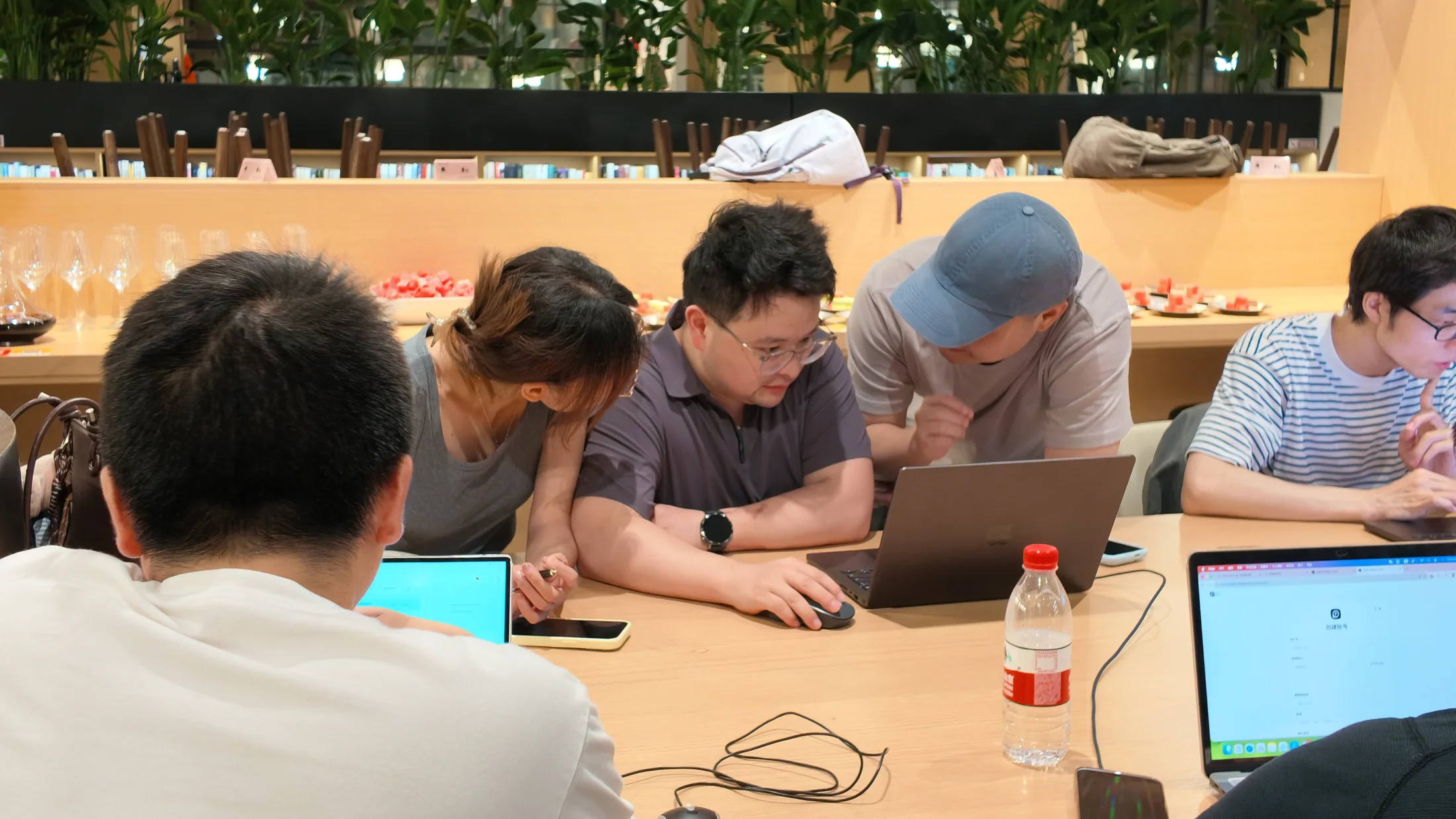 Participants comparing work and helping one another at the OpenDesign Shanghai workshop.
